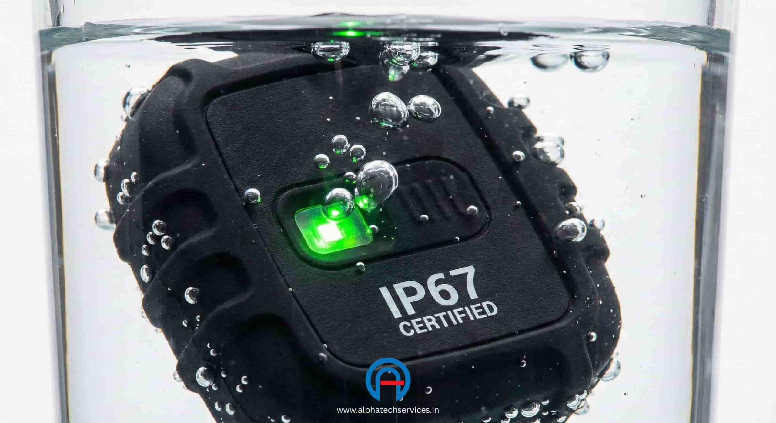 Close-up of Alphatech's IP67 certified waterproof GPS device submerged in water
